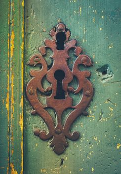 Vintage Ornamental Keyhole On A Rustic Old Door In Toulouse France