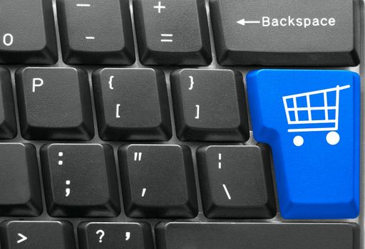 Close-up of Computer keyboard,  with blue Shopping key