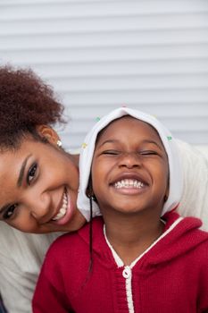 30-35, 4-6, african, apartment, background, beautiful, black, celebration, cheerful, child, christmas, cute, dad, family, father, gift, hair, happiness, happy, hat, home, homey, house, kid, leisure, life, living, model, old, parent, person, portrait, pretty, property, red, releases, room, sitting, smile, smiling, son, together, two, vertical, xmas, years, young