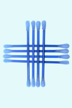 Pile of cotton swabs isolated on white.