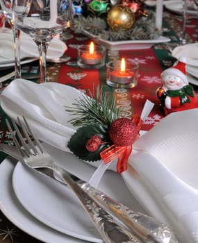 Decorative folded napkin on the Christmas table