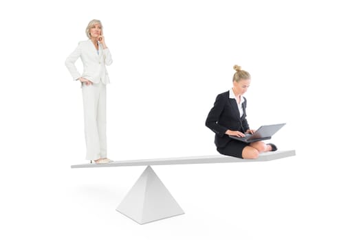 White scales measuring businesswomen on white background