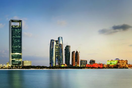 Panorama of Abu Dhabi at night, capital of United Arab Emirates 