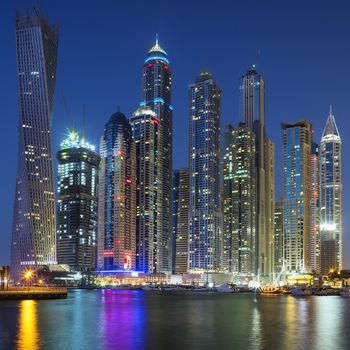Skyscrapers of Dubai Marina captured in the dusk.