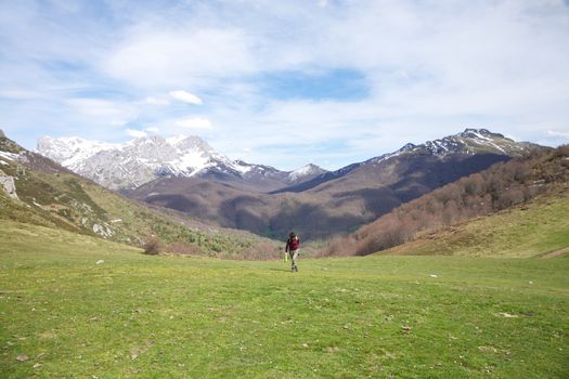 woman trekking at Picos de Europa mountains in Asturias