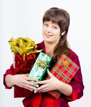 Young beautiful girl with a gift box