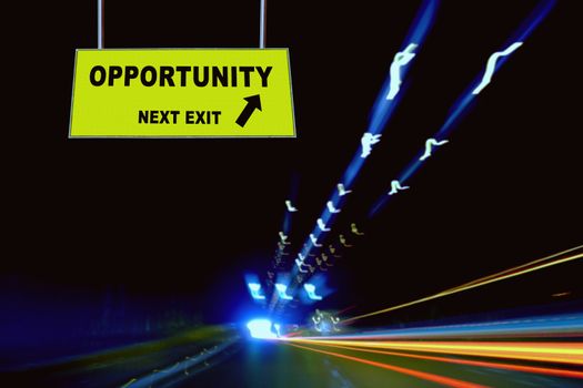 A Notice Board On A National Highway tunnel  Showing Opportunity Next Exit Concept