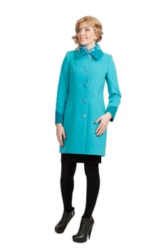 The girl in a turquoise autumn coat on a white background