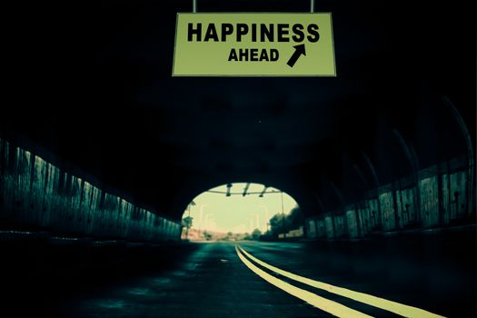 A Notice Board On A National Highway tunnel  Showing Happiness Ahead Concept