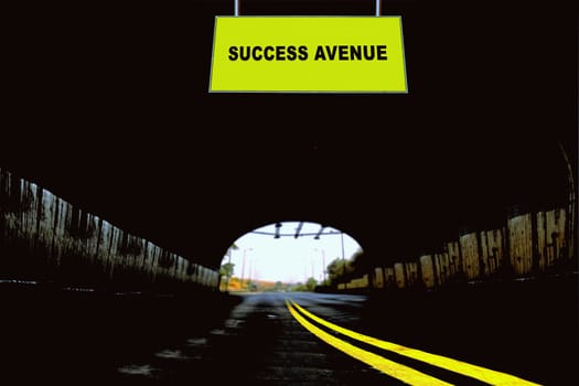 A Notice Board On A National Highway tunnel  Showing Success Avenue, Concept