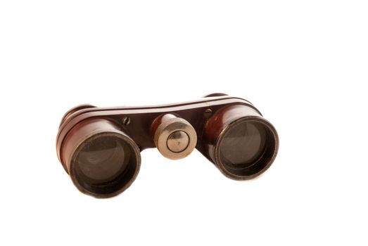 the old theater binoculars. Magnifying visual devices. Isolated