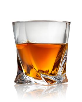 Glass of cognac isolated on a white background