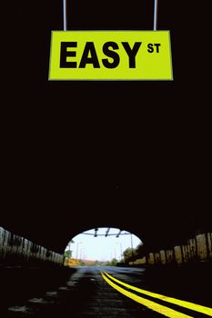 A Notice Board On A National Highway tunnel  Showing  Easy Street Concept