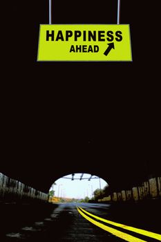 A Notice Board On A National Highway tunnel  Showing Happiness Ahead Concept