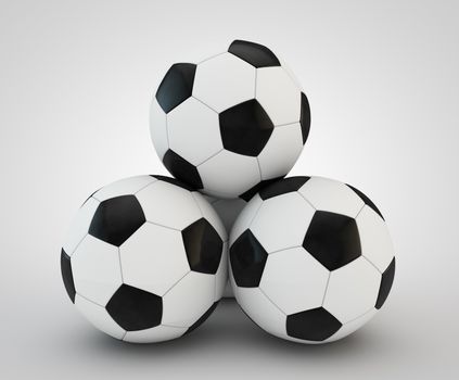 3d render of four soccer balls faced pyramid on white background