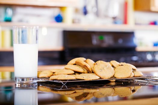 Snack of milk and cookies on kitchen counter