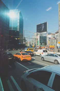 Seoul, South Korea - November 3, 2014: Traffic in the Sinchon, Seoul, Korea at day. It is lined with department stores, cosmetics and cafe.