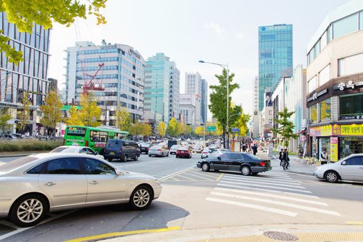 Seoul, Republic of Korea - November 4, 2014: Traffic approaching on a busy road through the Gangnam district on November 4, 2014 in seoul, Gangnam is an affluent district in Seoul, South Korea.
