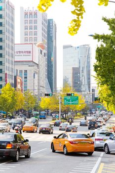 Seoul, Republic of Korea - November 4, 2014: Traffic approaching on a busy road through the Gangnam district on November 4, 2014 in seoul, Gangnam is an affluent district in Seoul, South Korea.