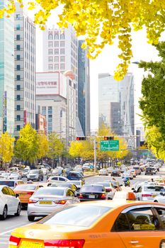 Seoul, Republic of Korea - November 4, 2014: Traffic approaching on a busy road through the Gangnam district on November 4, 2014 in seoul, Gangnam is an affluent district in Seoul, South Korea.