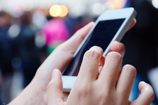 Teenage girl text messaging on her phone