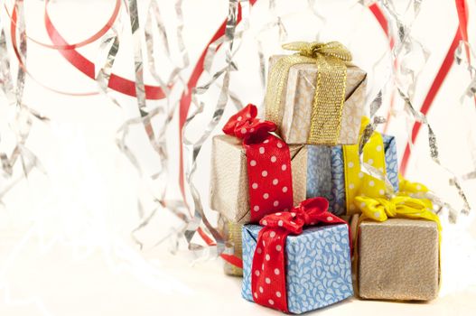 Christmas presents in colorful packaging with fiefs