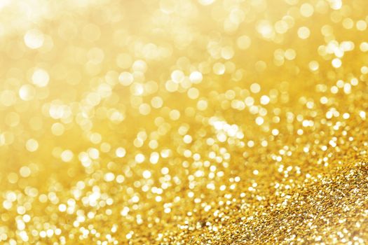 Abstract shining glitters gold holiday bokeh background