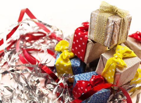 Christmas presents in colorful packaging with fiefs