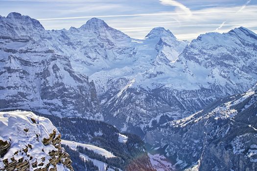 Swiss alpine peaks ridge at Jungfrau region  in winter