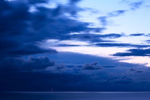 Storm clouds and lightning over Lake Titicaca viewed from the small tourist town of Copacabana in Bolivia