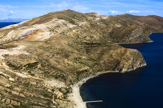 The Northern part of Isla del Sol (Island of the Sun), a popular tourist destination in Lake Titicaca, Bolivia. In the left lower corner the Tiwanaku-Inca ruin Chinkana is visible.