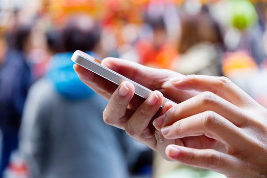 Teenage girl text messaging on her phone