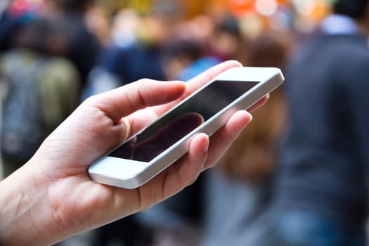 Teenage girl text messaging on her phone