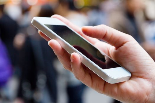 Teenage girl text messaging on her phone