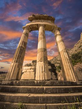 The Tholos at the sanctuary of Athena Pronoiat Delphi is a circular building that was constructed between 380 and 360 BCE. It consisted of 20 Doric columns arranged with an exterior diameter of 14.76 meters, with 10 Corinthian columns in the interior.
