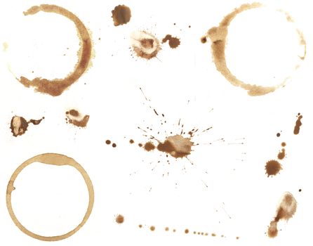 Collection of various brown coffee ring stains and splatters isolated on white.