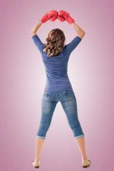 Fighting girl concept, rear view full length portrait of Asian isolated on white.