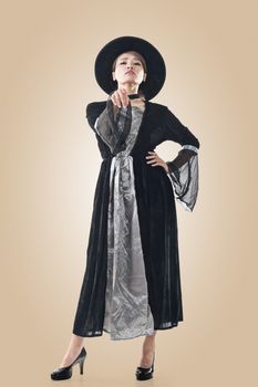 Asian witch woman, full length portrait.