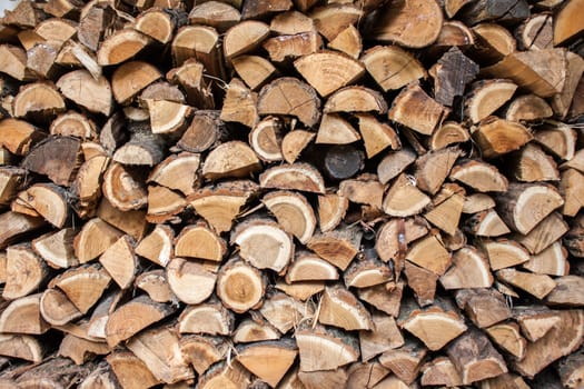 Stack of wood as background.