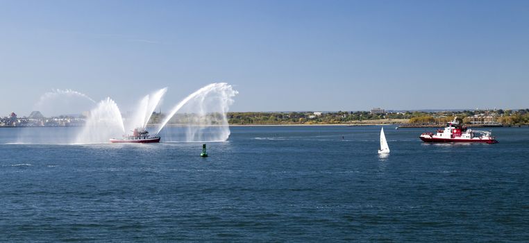 New York, USA, SEPT 27, 2014: The New York City Fire Department Boat practices maneuvers  in the Hudson River off New York City