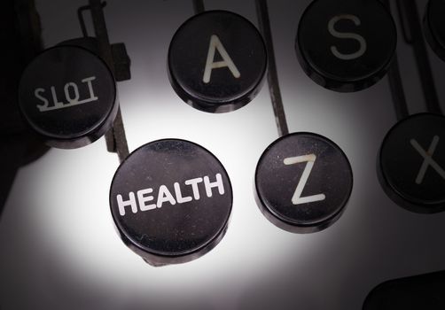 Typewriter with special buttons, health
