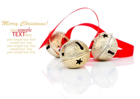 Christmas jingle bell with red ribbon, on white