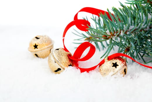 Christmas jingle bell with red ribbon, with snow
