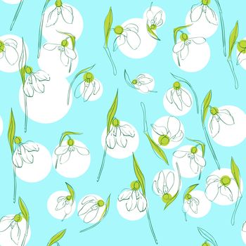 Seamless retro pattern with snowdrops over a blue background with spots