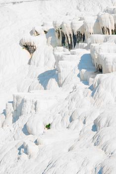 snow-white face of the mountain in Pamukkale, Turkey