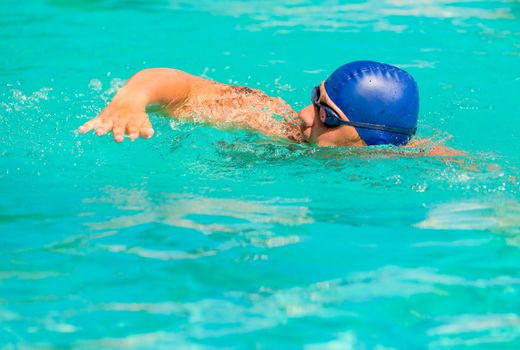 competition in competitive swimming in the pool outdoors