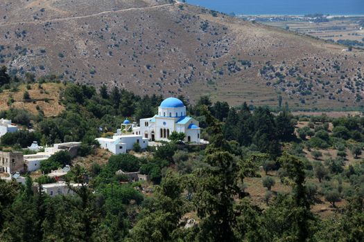 Typical Greek Orthodox church with blue domes on Kos.   Dodecanese. Greece