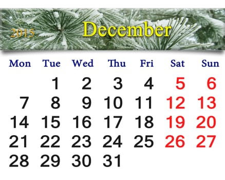 beautiful calendar for the December of 2015 with the ribbon of  evergreen spruce