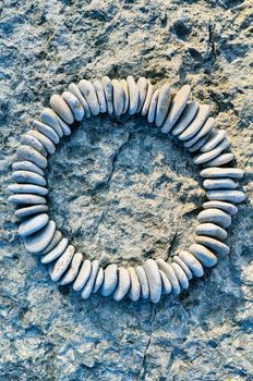 Sequence of small stones laid out in the form of a circle