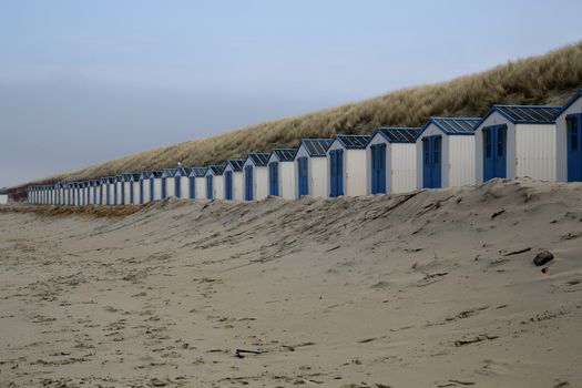 Blue beach houses at the beach in De Koog - Texel - Netherlands